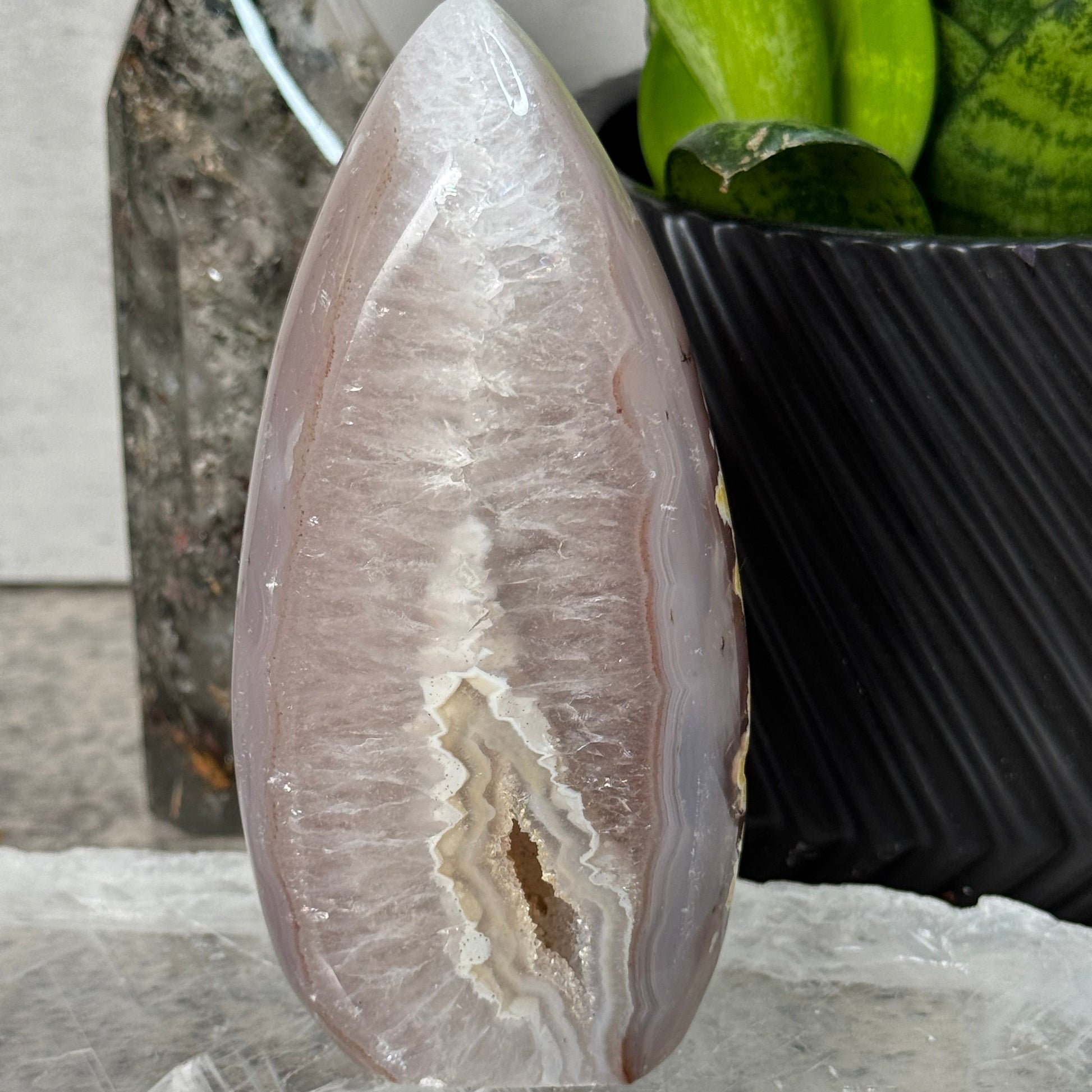 Polished stone with natural patterns on a marble surface