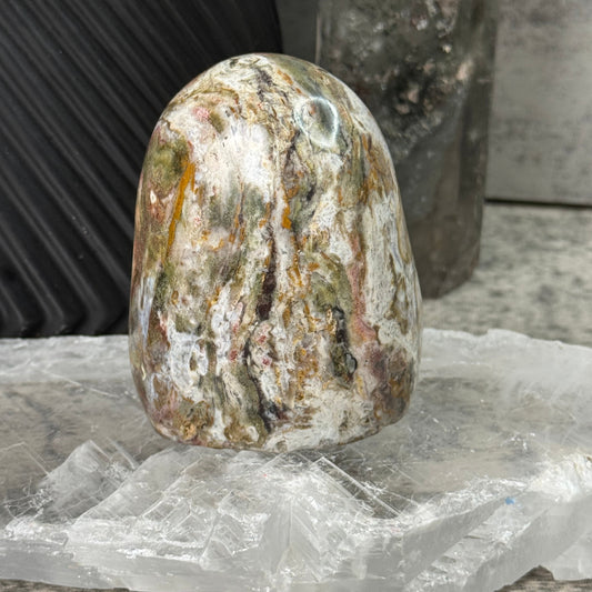 Decorative stone with a textured surface on a blurred background