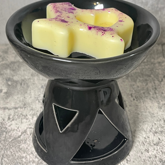 Black modern tea light warmer with TX shaped wax melt
