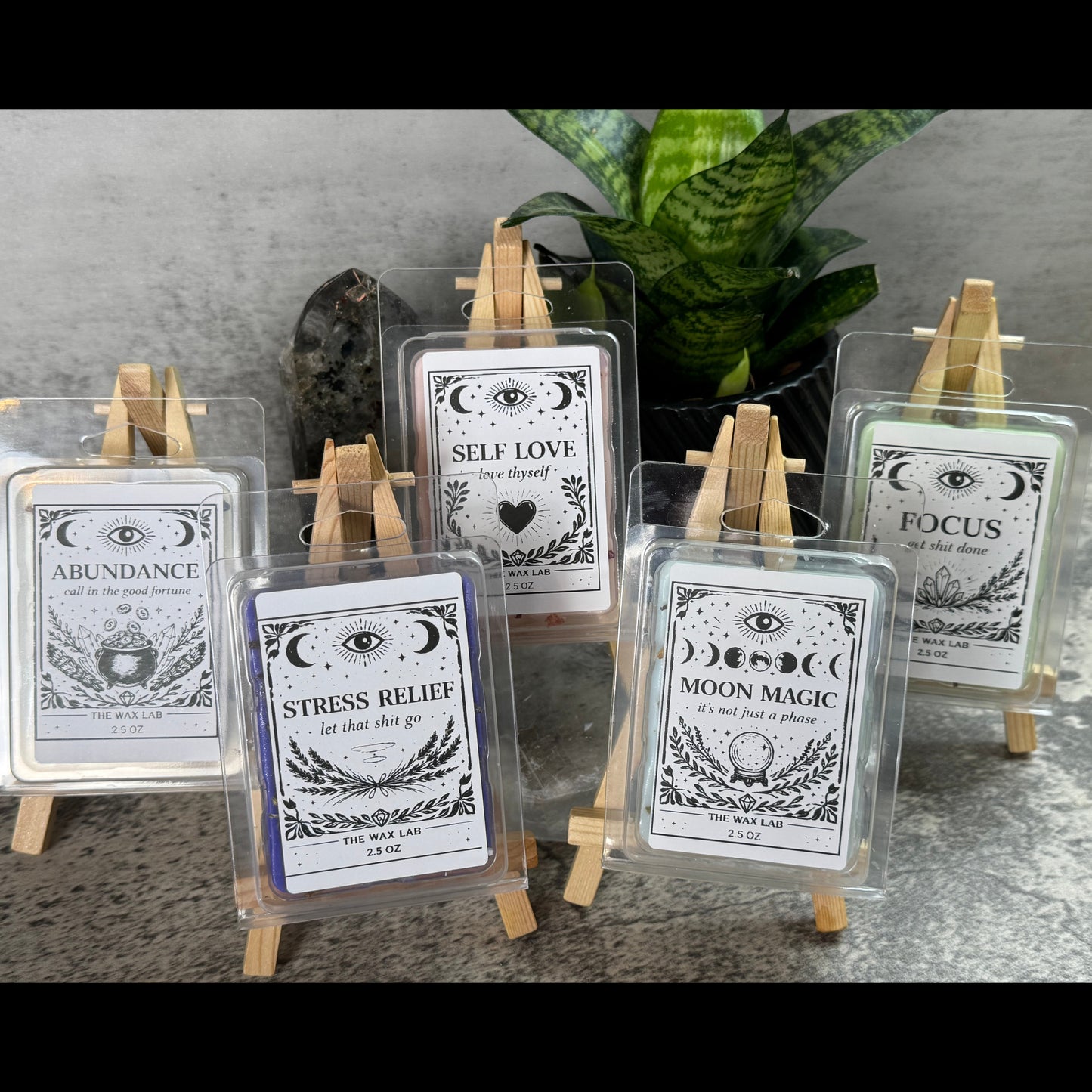 Set of tarot cards on small easels with decorative backgrounds