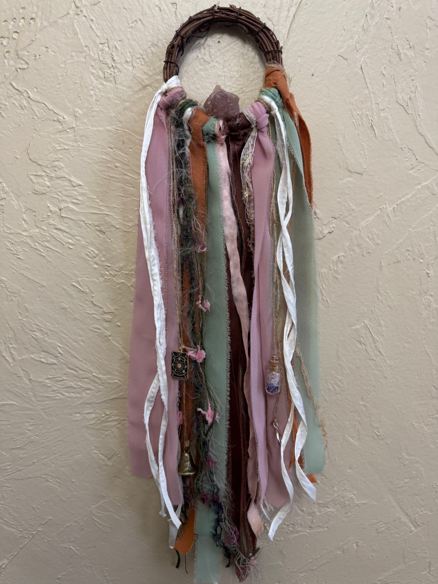 Decorative headband with ribbons on a beige background