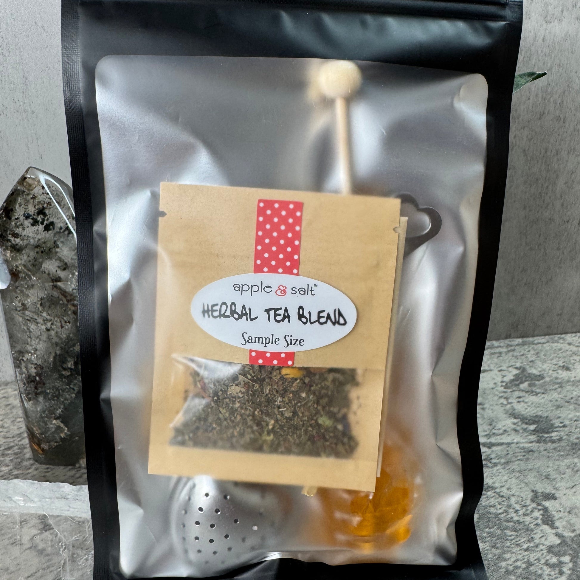 Tea package with a label on a reflective surface